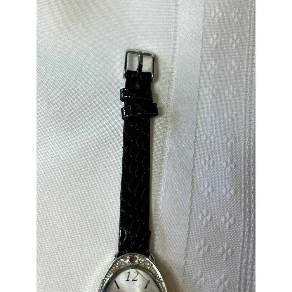 Women's Silver Analog Watch New Battery Arabic Numerals Oval Dial 2010s Casual